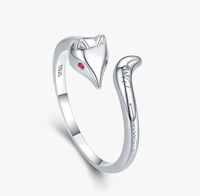 I AM INARI adjustable sterling silver ring designed to look like a fox. Red zircon eyes and subtle design carved on the tail