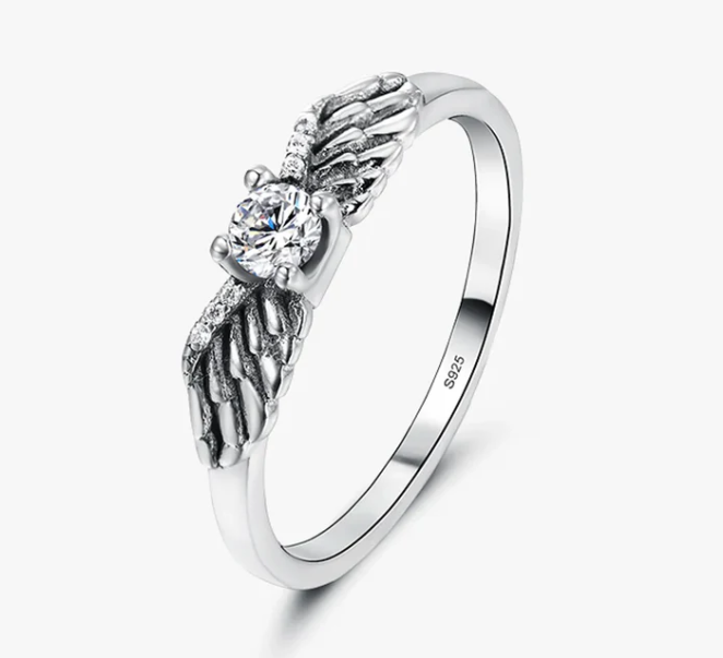 Angel wings ring, angel wings solitaire ring, vintage angel wings ring, a vintage inspired diamond ring with angel wings in sterling silver.