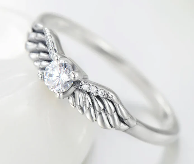 Angel wings ring, angel wings solitaire ring, vintage angel wings ring, a vintage inspired diamond ring with angel wings in sterling silver.