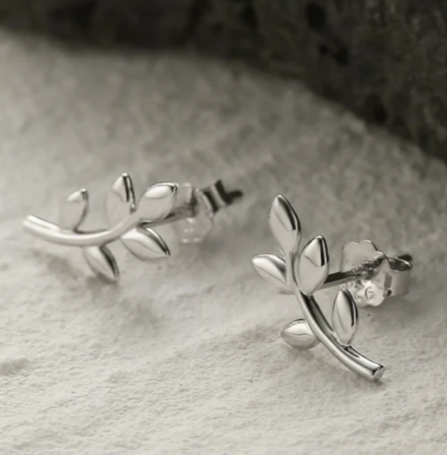 Shown on a granite slab, these are the I AM ATHENA Sacred Vine Earrings from Freya Canada. 925 sterling silver and ships from Vancouver BC.