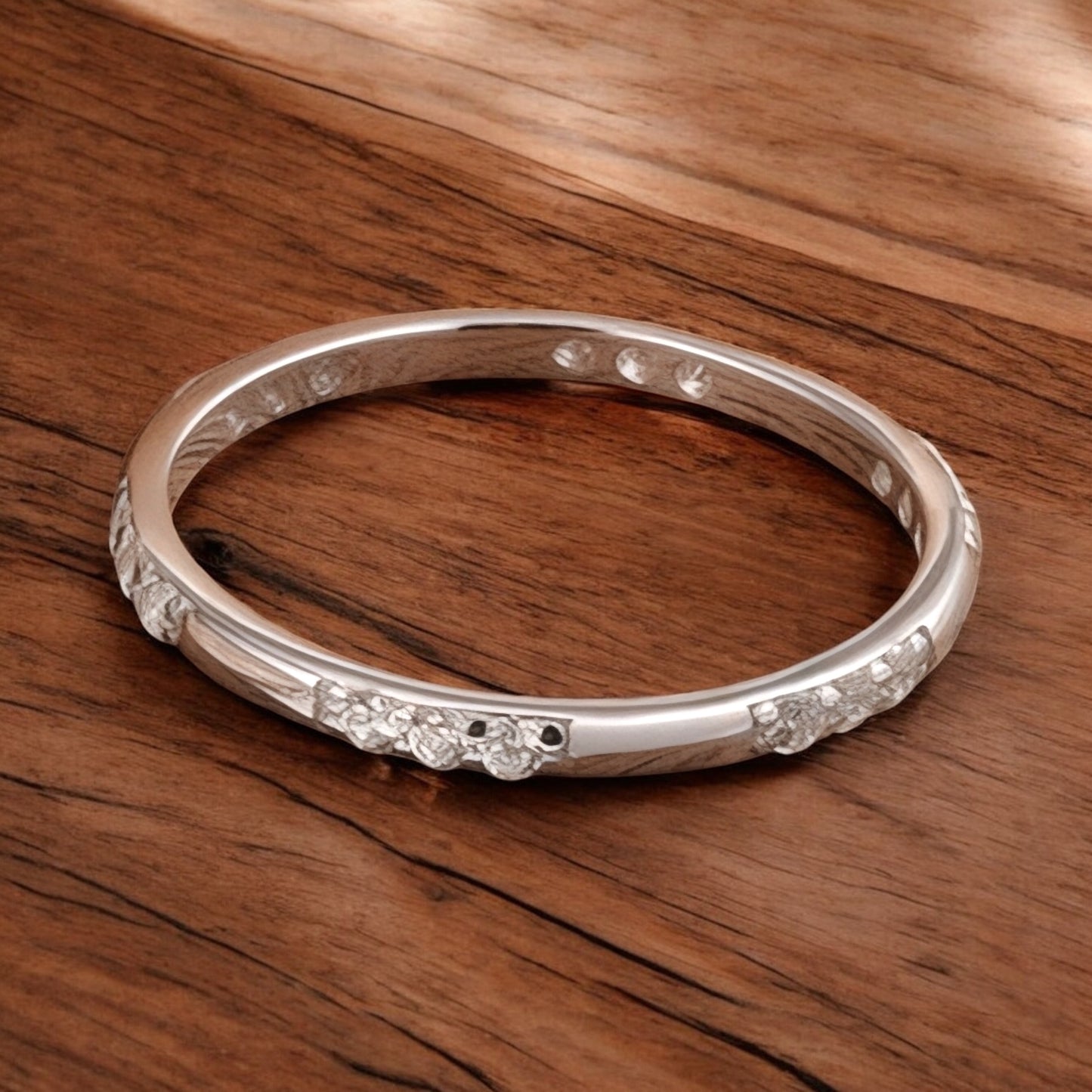 Freya Canada’s I AM ARTEMIS Delicate Pave Ring in sterling silver and zircon on a wooden table