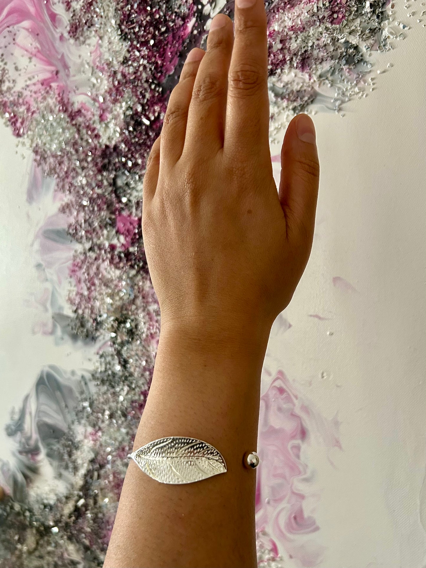 Model is wearing the I AM ARTEMIS Wild One Leaf Bangle from Freya Canada. Ships from Vancouver BC.