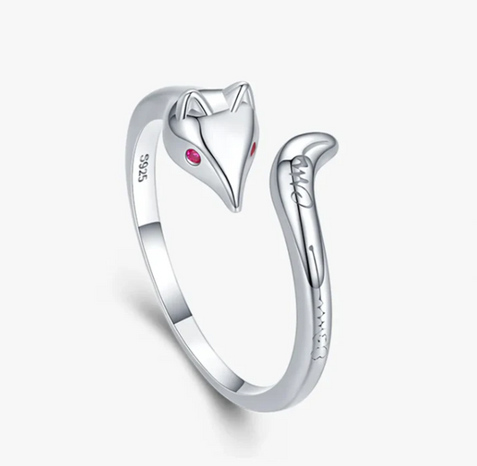 I AM INARI adjustable sterling silver ring designed to look like a fox. Red zircon eyes and subtle design carved on the tail 