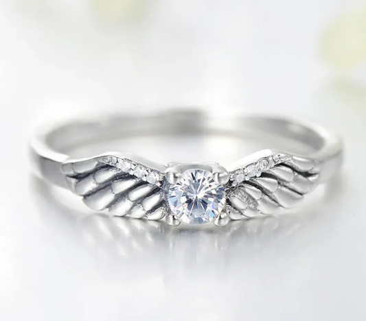 Angel wings ring, angel wings solitaire ring, vintage angel wings ring, a vintage inspired diamond ring with angel wings in sterling silver. 